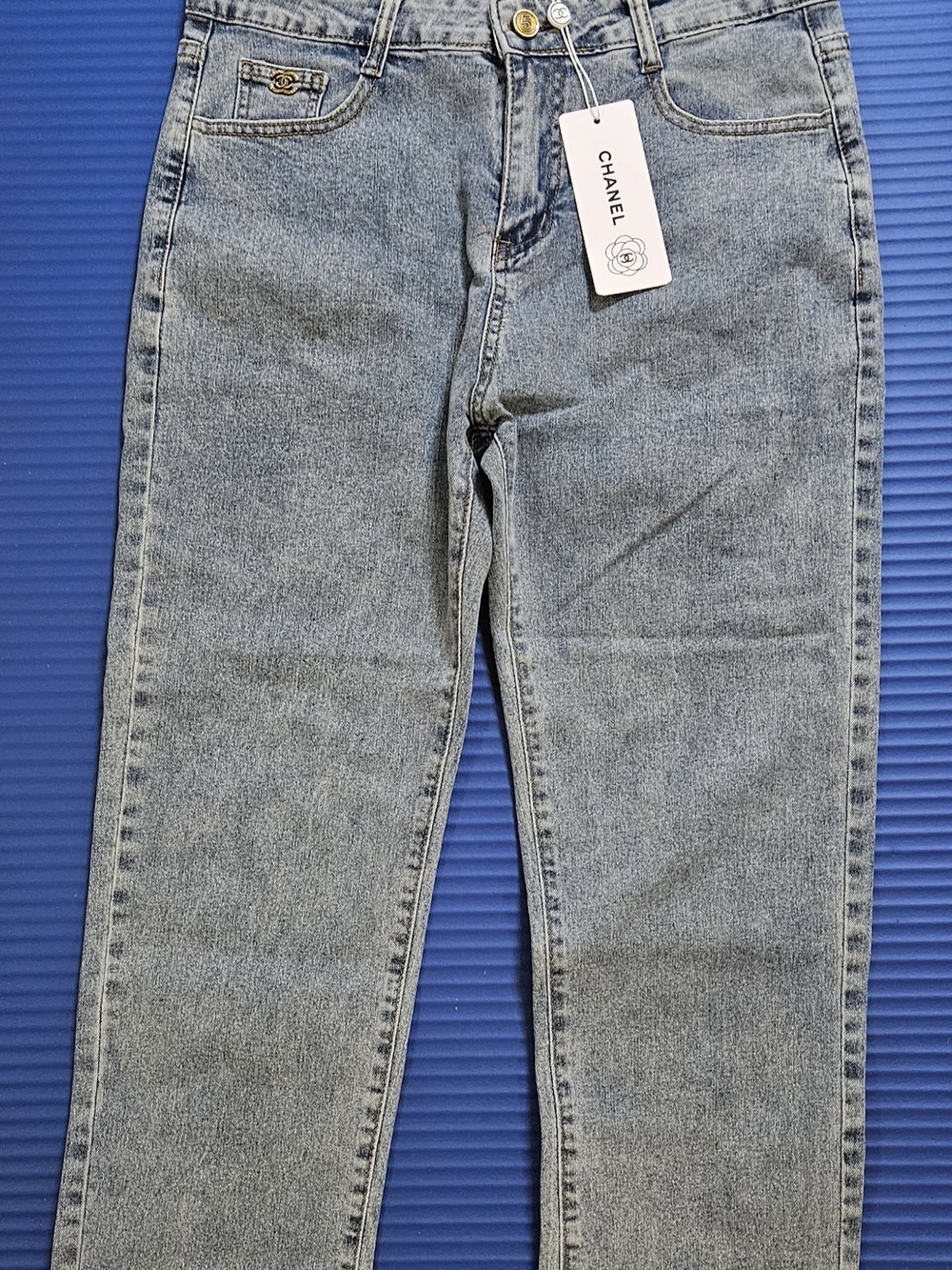 Light Blue High-Rise Women’s Jeans with Gold Button Accent - Picture 2 of 9